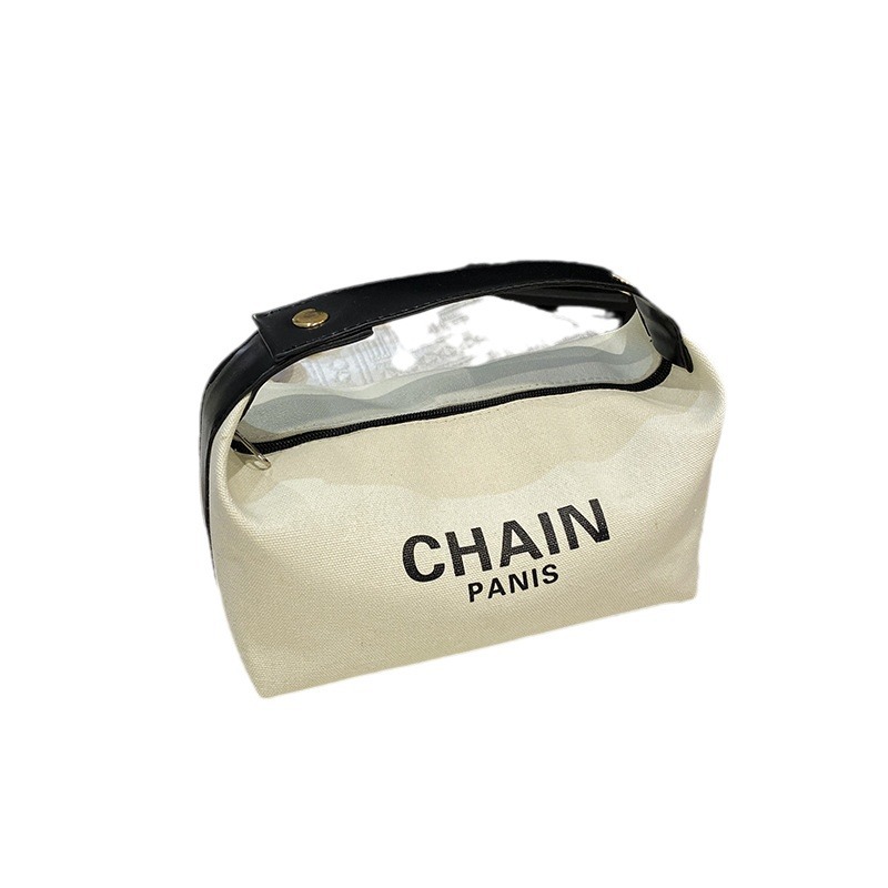 Bolsa de maquillaje de lona simple, nuevo estilo de aire extranjero, bolsa de mano de gran capacidad de almacenamiento, bolsa de almacenamiento simple para viajes