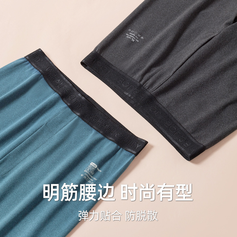 Ropa interior térmica de los hombres Calzoncillos largos finos de calefacción sin costuras traje de los hombres jóvenes de color sólido cuello redondo terciopelo Calzoncillos largos