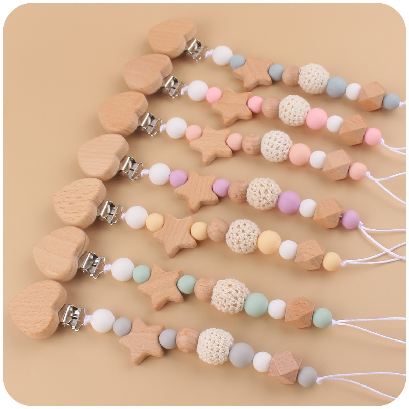 Nuevo bebé de dibujos animados melocotón corazón Haya clip calmante bebé DIY estrella mordedura chupete cadena anti-gota cadena