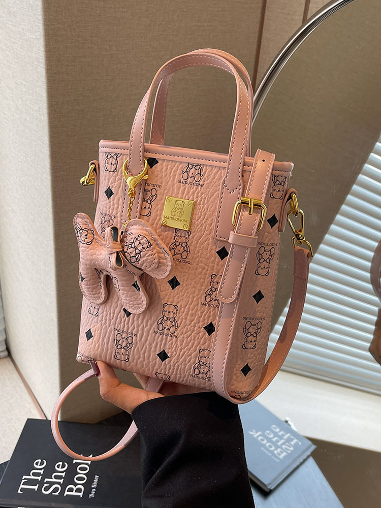 Bolsos de mujer transfronterizos nuevo bolso de diseño de nicho bolso de teléfono de oso de dibujos animados bolso de cubo de sentido avanzado bolso de mujer lindo