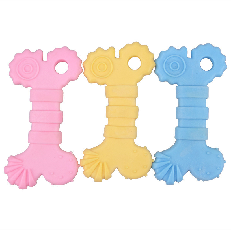 Suministros de juguete para mascotas TPR espuma roer molares hueso pequeño leche sabor hueso plano juguetes para perros en stock al por mayor