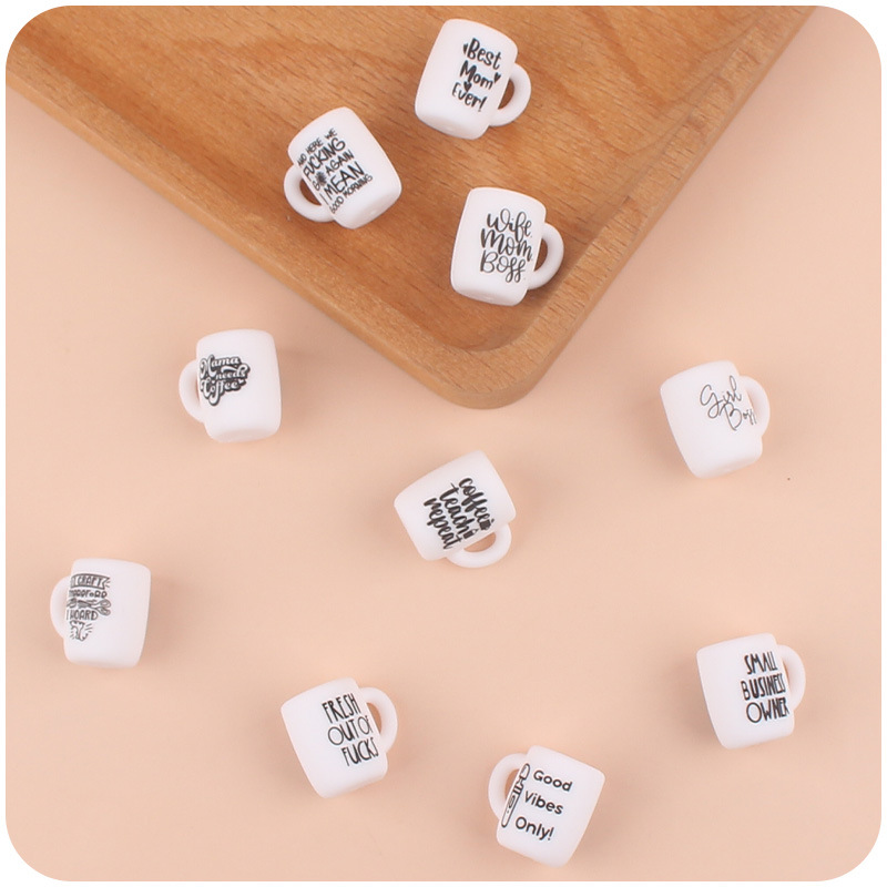 Bebé suministros de dibujos animados taza juguete creativo DIY personalidad pequeña taza teether pezón cadena pulsera accesorios pequeños