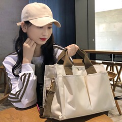 韓国のマミーバッグ多隔層実用2024手持ちシングルバッグ大容量母子バッグins百合レジ袋