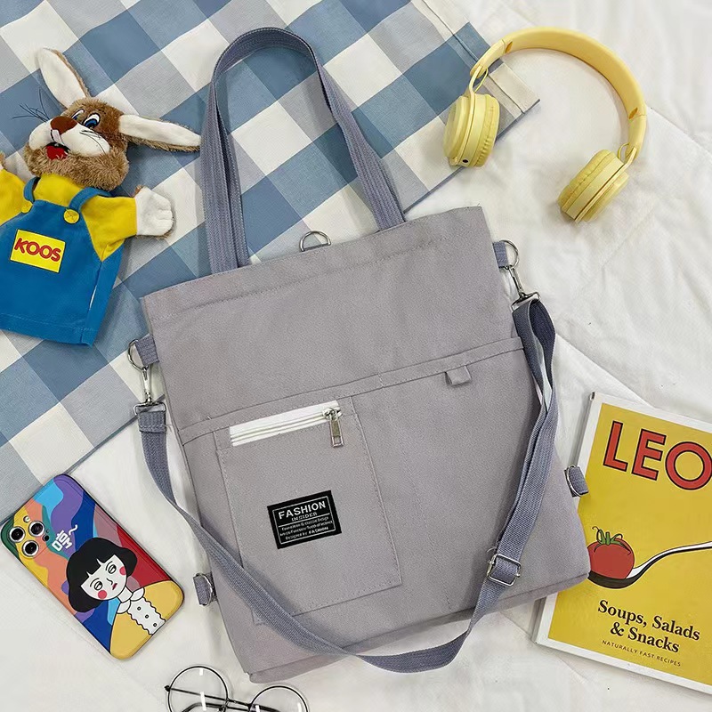 Bolso de lona de un solo hombro coreano para mujer multiusos ins Mochila de almacenamiento para estudiantes universitarios de moda