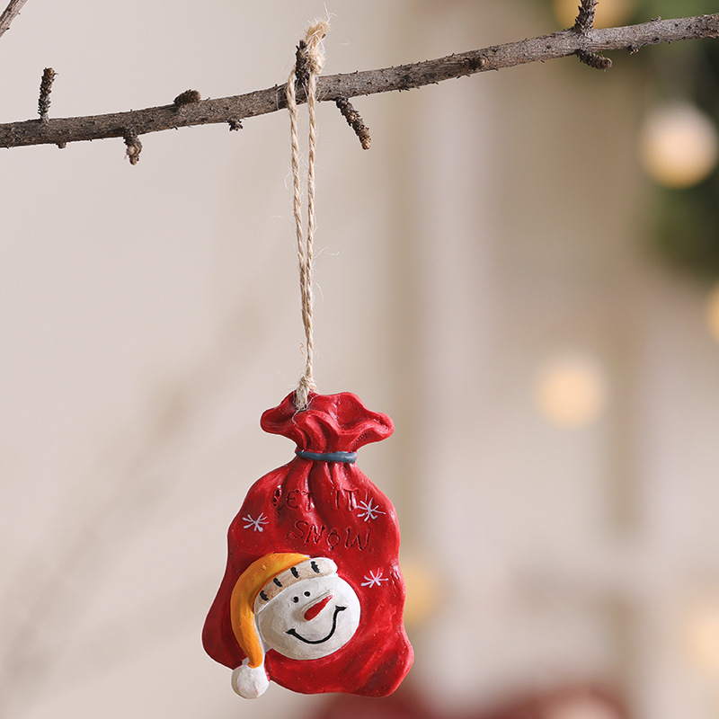 Nuevos colgantes de resina transfronterizos colgantes de decoración de árbol de Navidad para viejos muñecos de nieve bolsas de regalo de decoración de Navidad americana