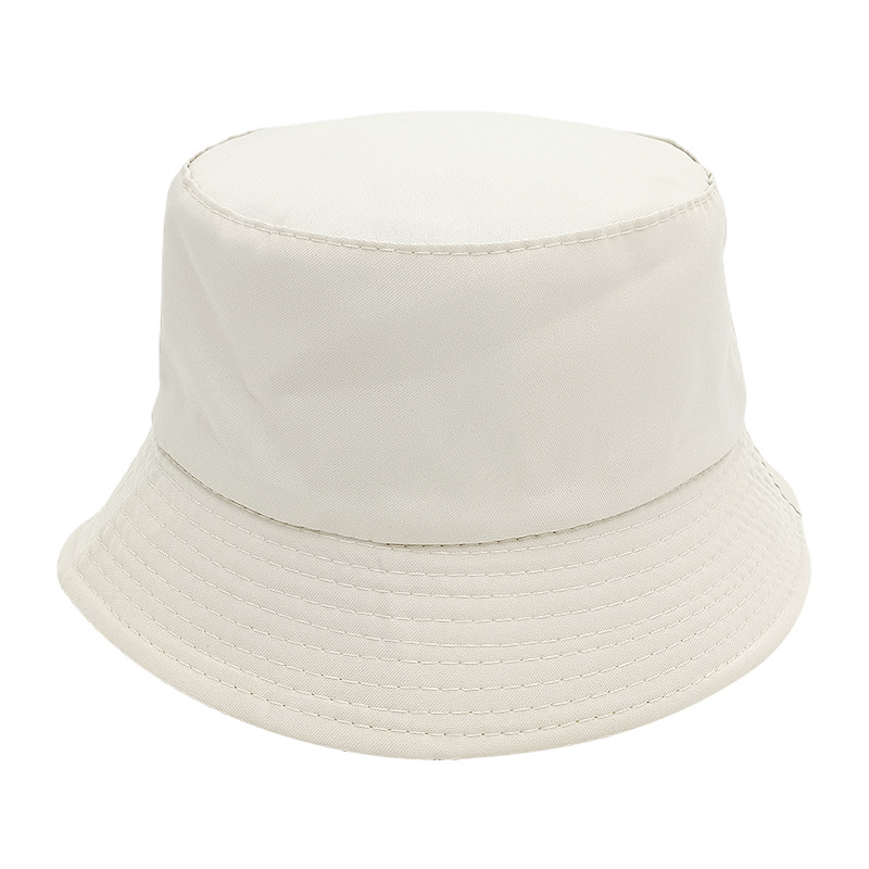 Productos de puestos de tierra Sombrero de pescador de color sólido barato Sombrero de camuflaje de protección solar de doble cara personalizado Sombrero de publicidad de viajes de tablero de luz al por mayor