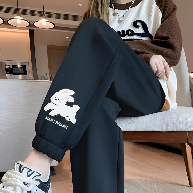 흰 토끼 레깅스가 달린 얇은 검은 색 바지