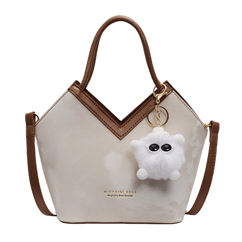 Bolsa de diseño de nicho para mujeres de gran capacidad 2025, nuevo bolso de cubo casual universal bolso de hombro casual de mano