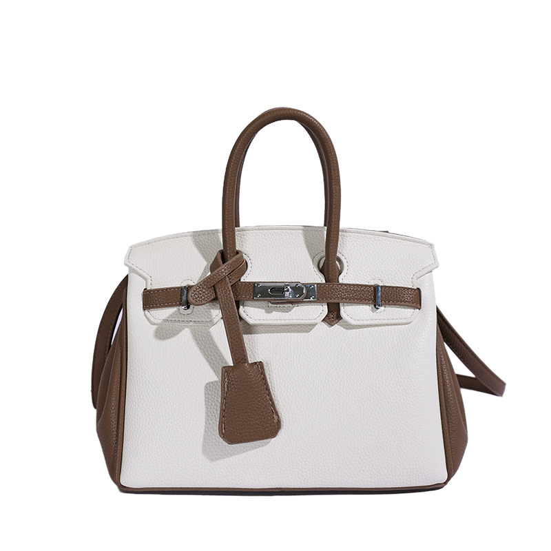 Bolso de platino portátil de litchi para mujeres 2026 comercio exterior nuevo estilo de alto nivel de sensación de tamaño de estilo de hombro mochila