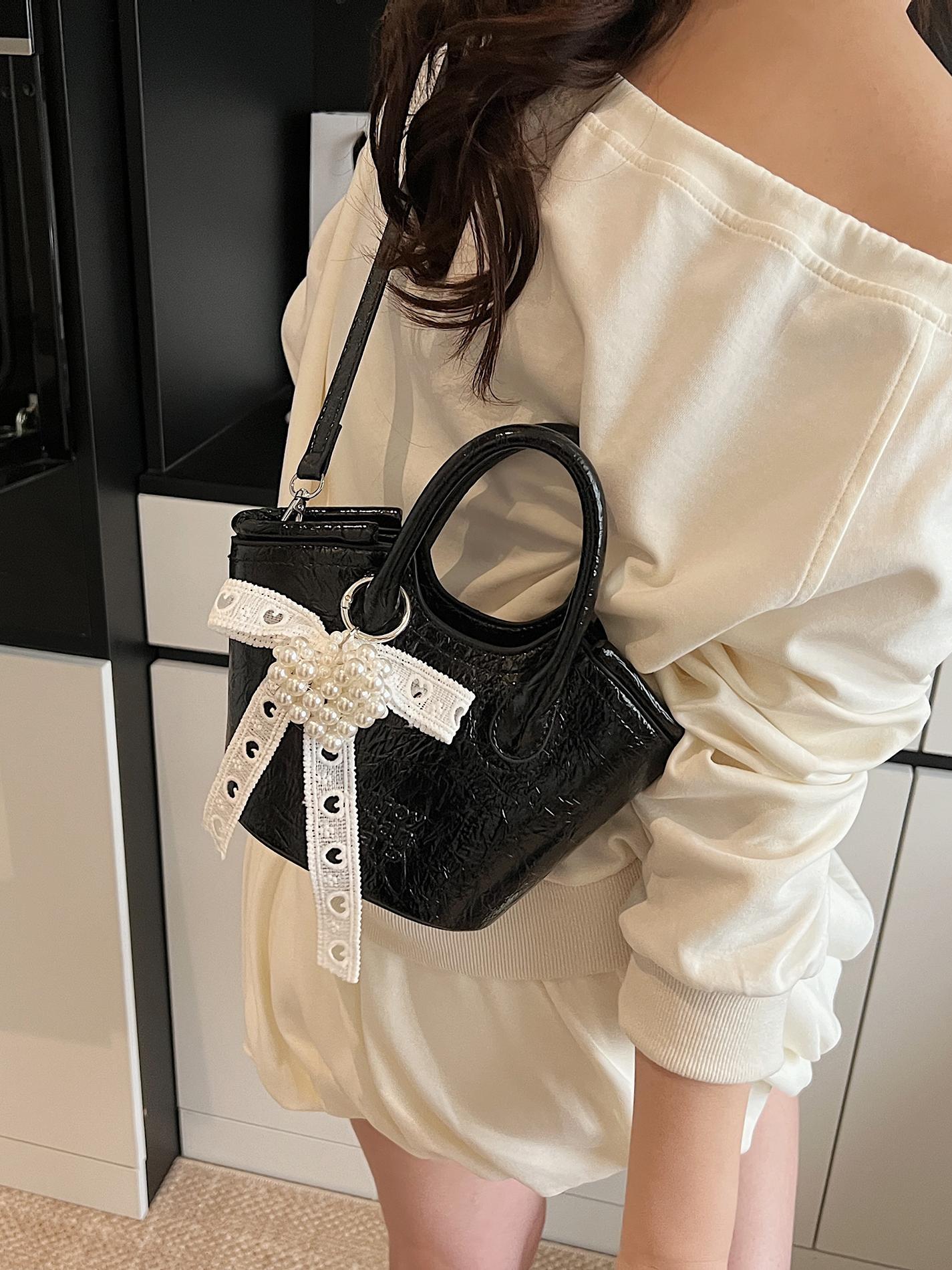 Bolso de cubo de mano de nicho de comercio exterior 2025 nuevo producto bolso de mensajero de moda casual de todo fósforo bolso de hombro de viaje de trabajo de moda