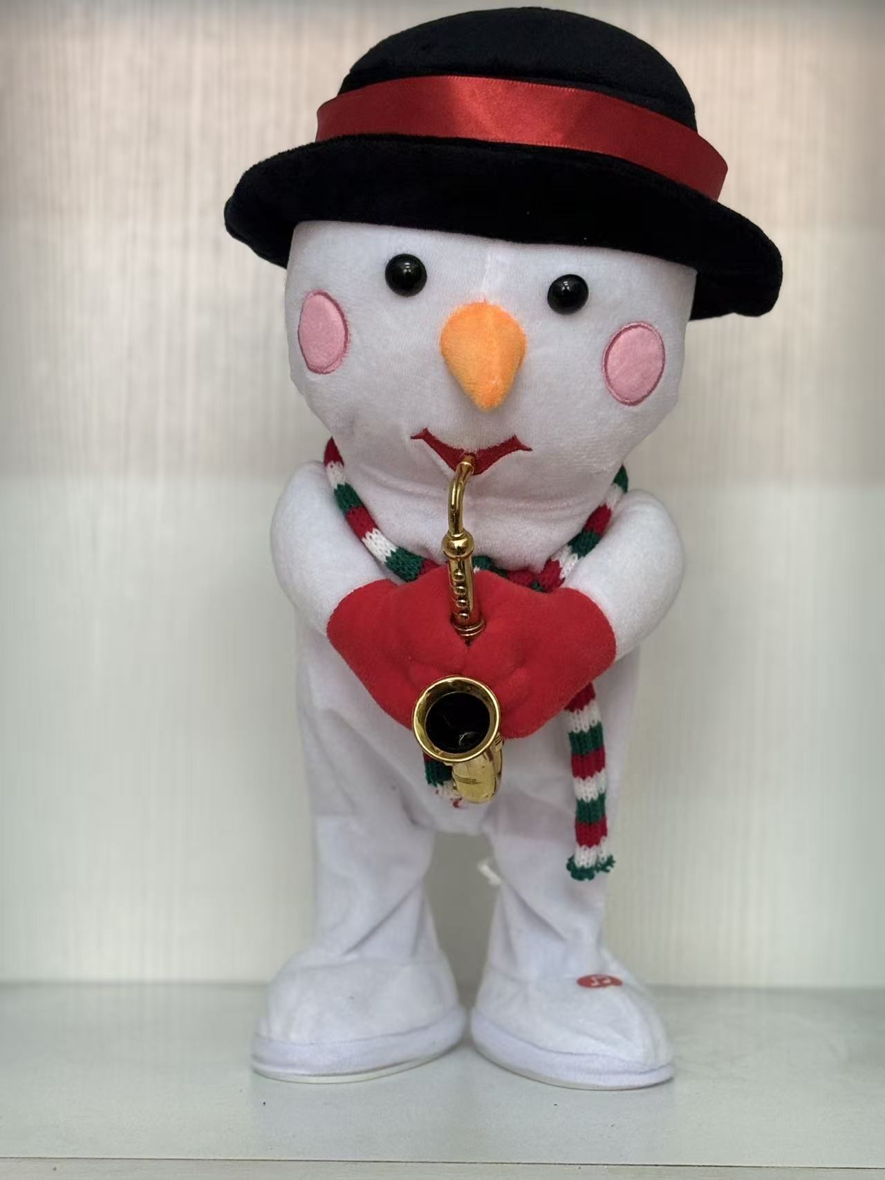 Muñeco de nieve saxofonista