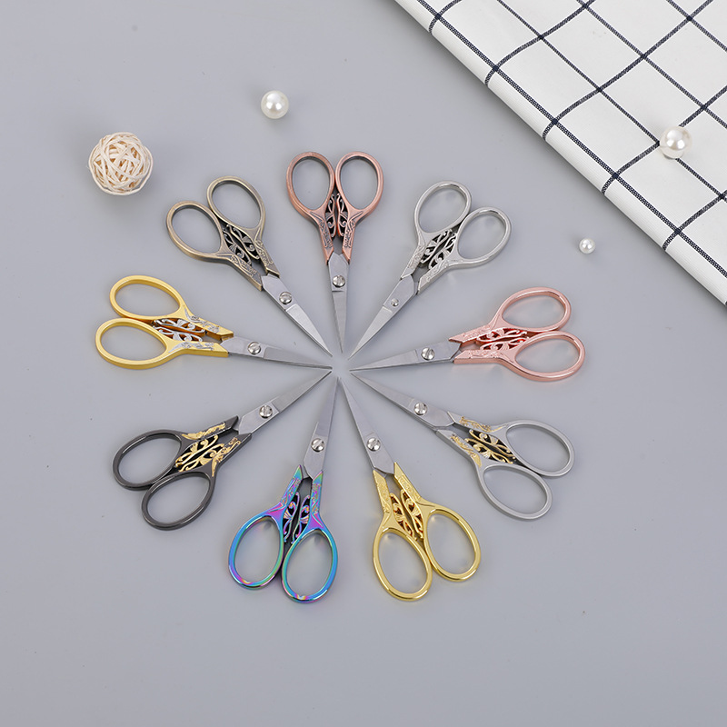 Classical colored titanium plum blossom scissors, stainless steel craft scissors, cross stitch DIY scissors, beauty tools, retro small scissors wholesale