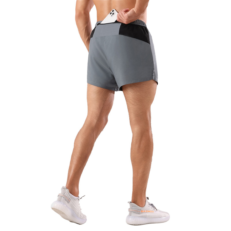 Pantalones cortos deportivos de tres puntos para hombres de verano de secado rápido que absorbe la humedad maratón profesional corriendo pantalones de entrenamiento físico de doble capa anti-exposición
