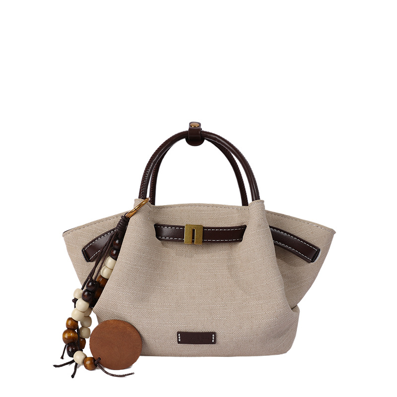 Nicho coreano bolsas de mano tote mujeres 2026 comercio exterior nuevo relajado sensación universal hombro mochila canasta de verduras
