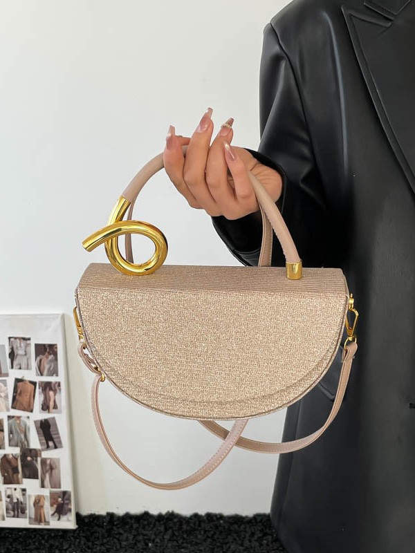 Nicho de diseño de bolso de silla de montar medio círculo, bolso de mano de textura de alta calidad, moda lujosa, bolso de hombro universal.