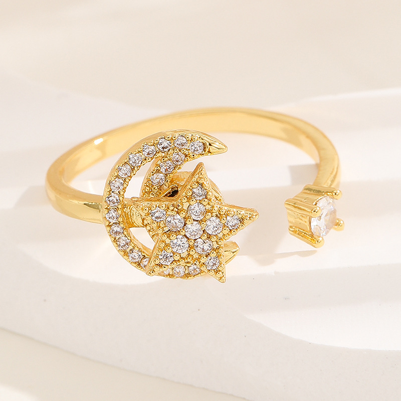 18K oro real color-preservar la suerte de la hierba estilo coreano transfronterizo diamante incrustado rotación de moda abierto anillo ajustable