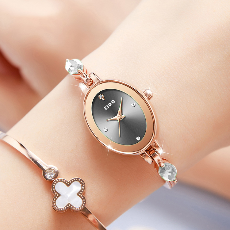 Elegant oval quartzklocka med diamanter för dam_voghion.com