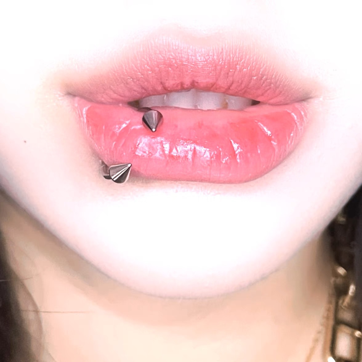 Pointed labret stud close-up product detail