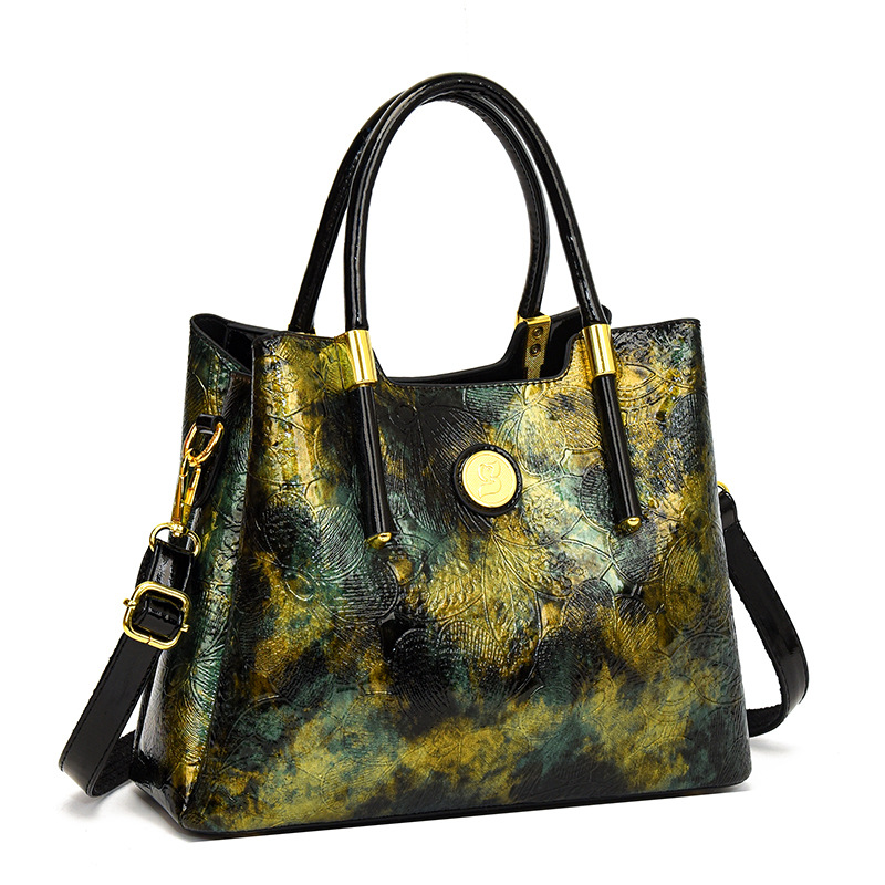 Bolsa pequeña para mujeres 2024 nueva moda de cuero suave de color sólido bolso de madres de mediana edad temperamento simple bolso casual versátil