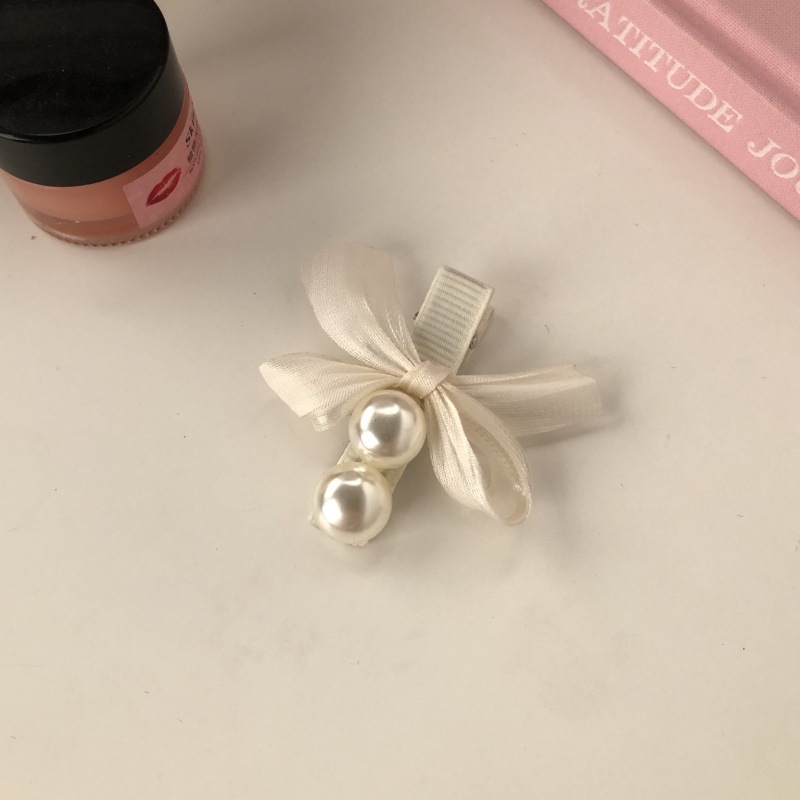 With bow, beige