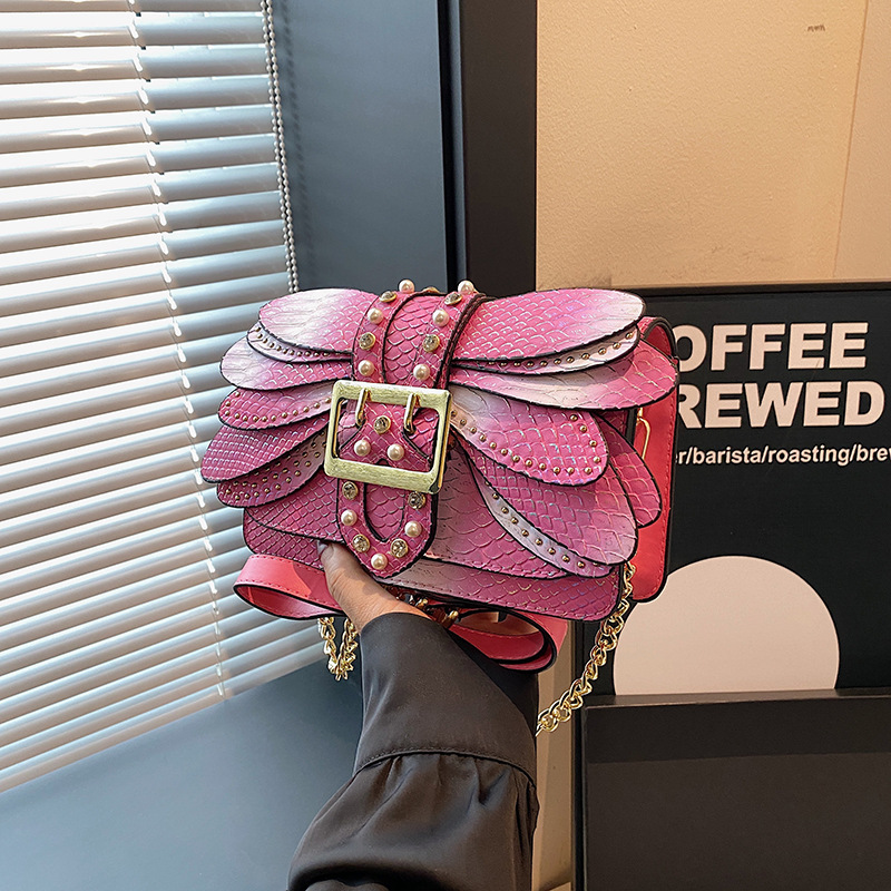 Bolso de mujer con alas de mariposa roja neta de alto valor, bandolera, remache, nuevo bolso de cadena, moda, doble uso