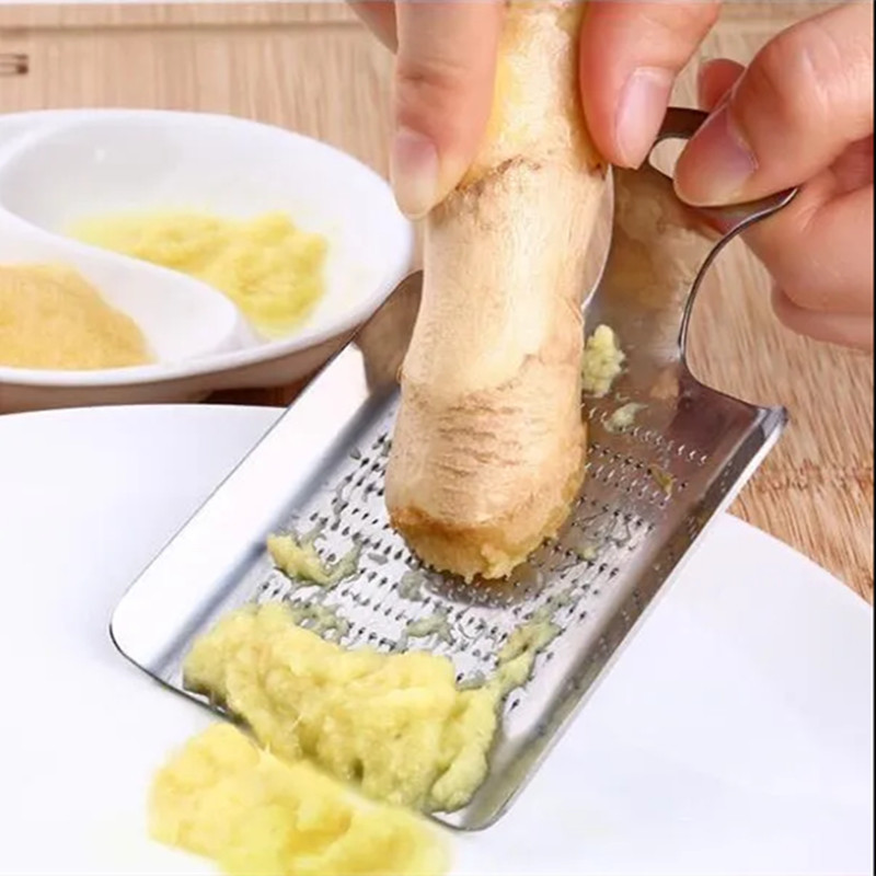 ショウガを研ぐ器の家庭用の自作の紅糖の姜茶の道具はショウガの泥を拭いてショウガのニンニクをつぶしてショウガの汁の機をつぶして姜蓉の神器を削ります。|undefined