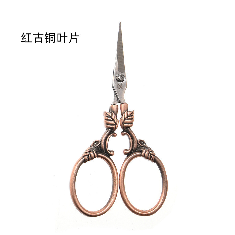 Hoja al por mayor forma exquisita tijeras pequeñas flor de punto de cruz clásica europea hoja de caja de acero inoxidable