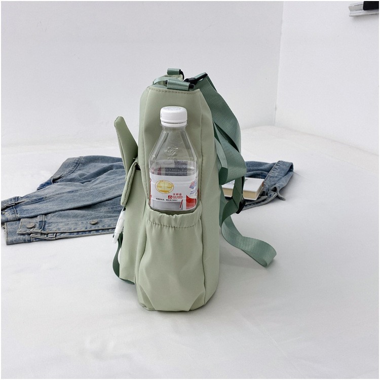 2024 estudiantes bolso de estilo explosivo simple y de gran capacidad nuevo bolso de mensajero de un solo hombro de moda para mujer bolso de viaje