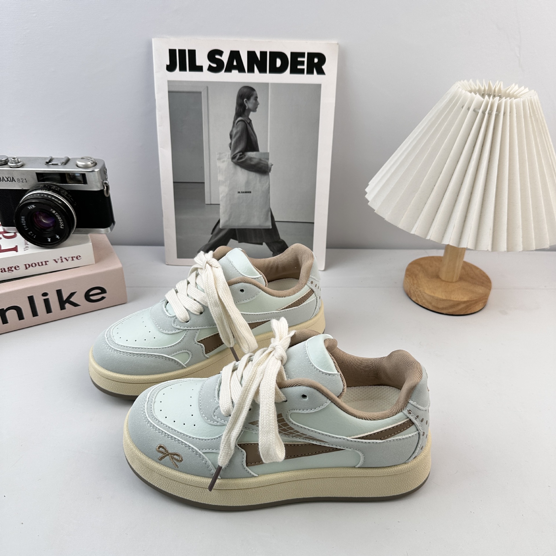 Yuanbo coreano rosa versátil zapatos de skate para mujeres 2025 otoño nuevos estudiantes zapatos deportivos casuales zapatos de entrenamiento alemán pequeños zapatos blancos