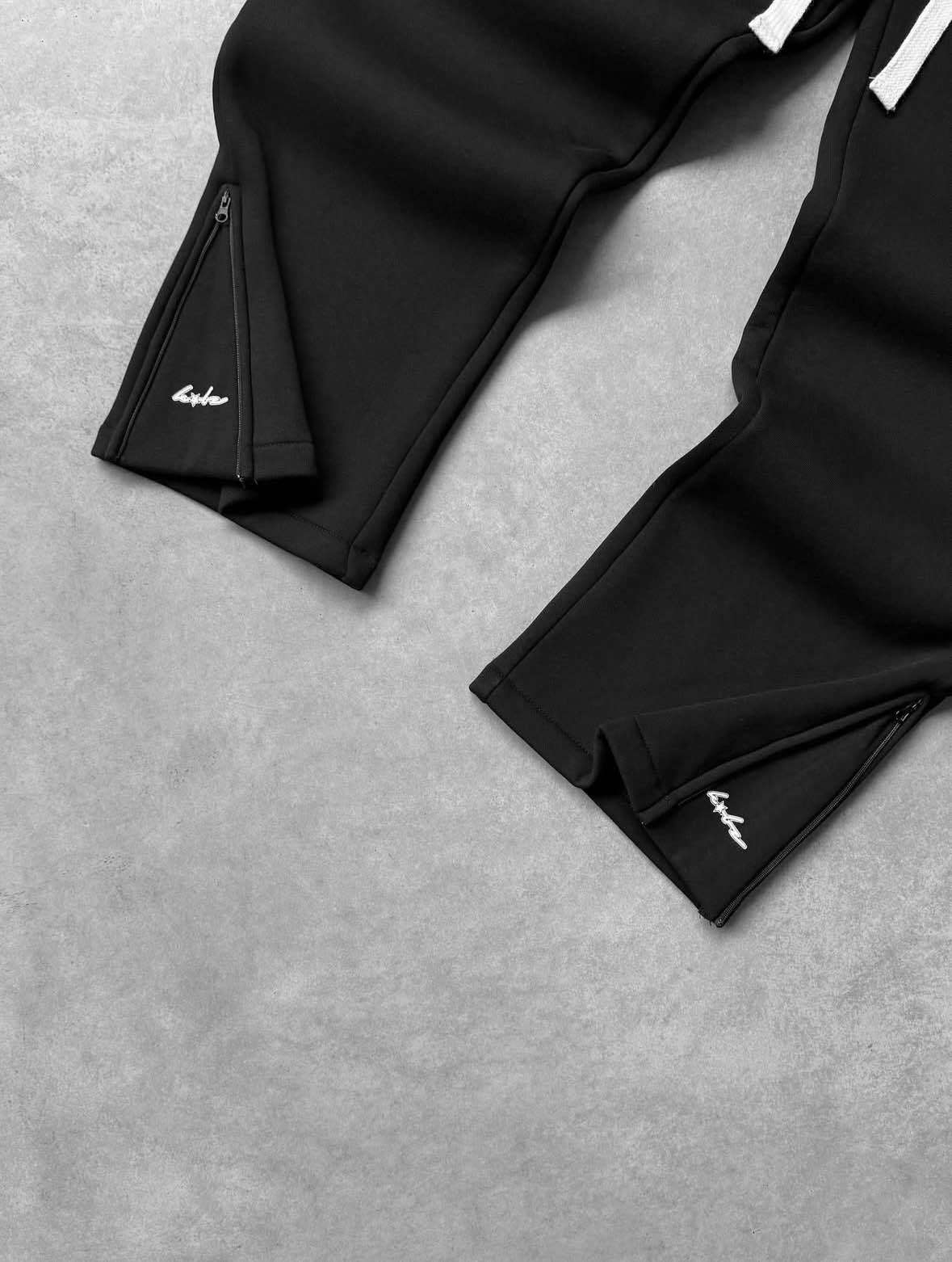 2025 Europa y América Cross-border street hip-hop holgados pantalones casuales rectos pantalones con cremallera pantalones de cintura doble falsos de dos piezas