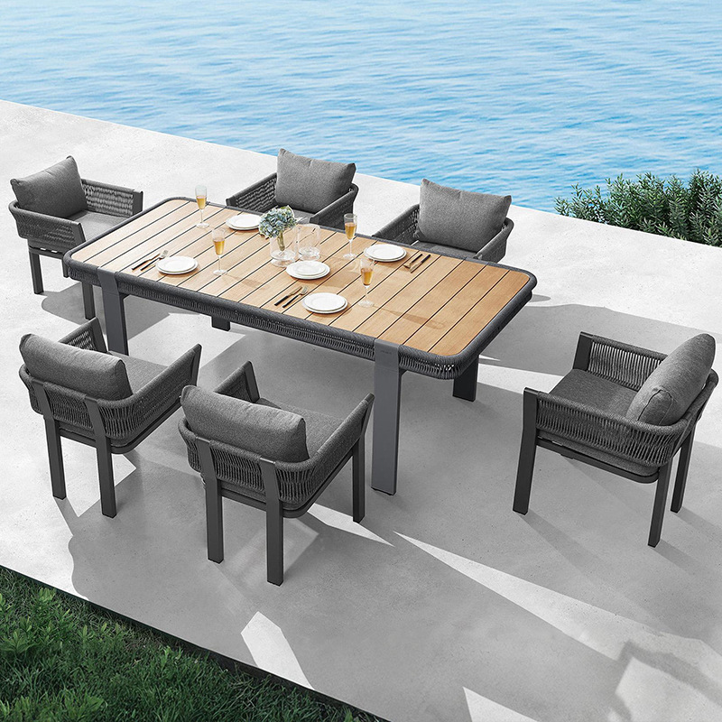 Mesa y silla de ocio al aire libre patio villa jardín combinación de tela de caña hotel residencial terraza al aire libre silla de caña impermeable image 12