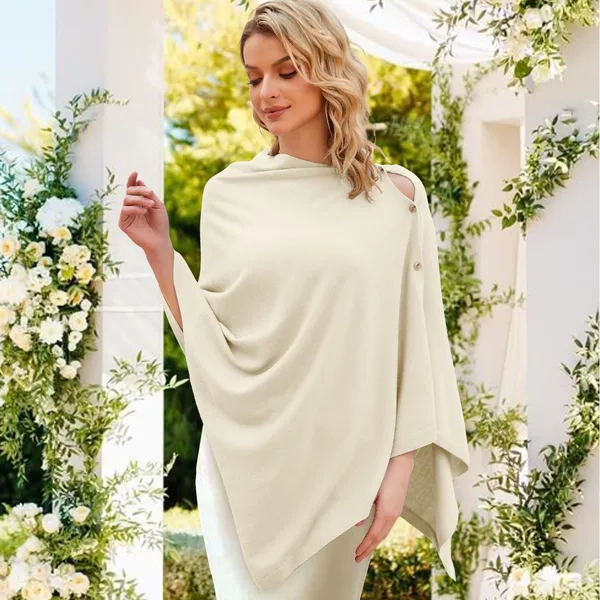 New solid color knitted shawl for women, with buttons and an irregular cape design, suitable for autumn and winter, warm and versatile for air-conditioned settings, with multiple wearing styles