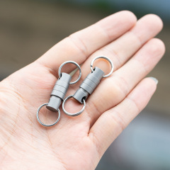 チタン合金の快速取り外し式のキーホルダーのクイック引き抜きの鍵のボタンの子の母のボタンの自動車のバックルの伸縮のバックルの万向節の押し引きのボタン