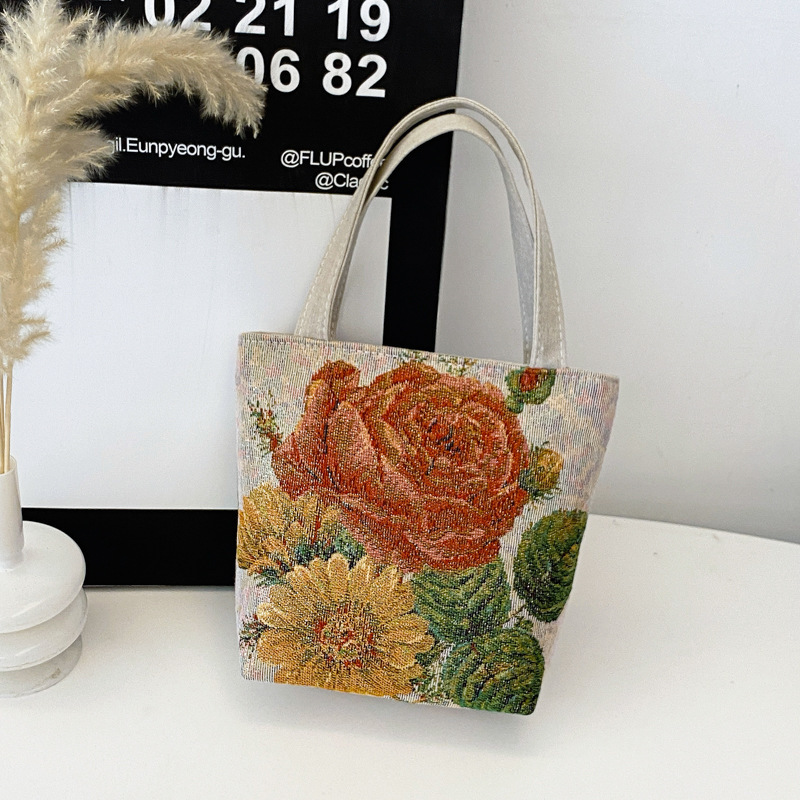 新しいファッショナブルで多用途なカジュアルな気質の女性のキャンバス両面ゴールデンシルクジャカード刺繍蝶ハンドバッグママバッグ|undefined