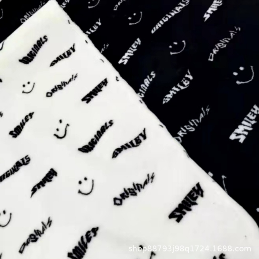 慈溪毛绒供应笑脸 字母 迷彩羊羔绒等各类提花羊羔毛