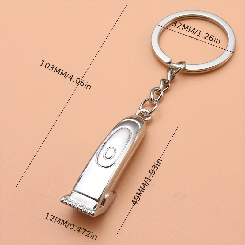 Serie de oro de aleación de venta transfronteriza caliente fútbol béisbol rugby sombrero hechicero puño llavero colgante mochila