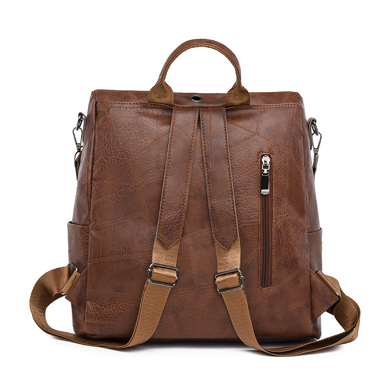 Comercio exterior al por mayor 2023 nueva mochila de cuero suave para mujer retro simple y versátil mochila de viaje multifuncional mochila escolar