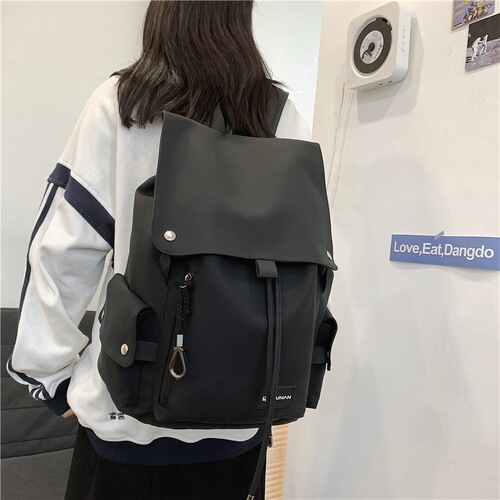 Trendy men's and women's backpacks wholesale water-repellent motorcycle large capacity large cover student school bag new backpack