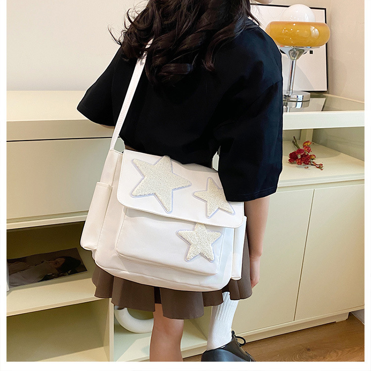 Cross-border wholesale large-capacity five-pointed star canvas single-shoulder bag, cute school style crossbody bag, student commuting bag for classes undefined