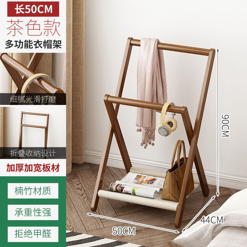 寝室の夜に寝て、ズボンを掛けてハンガーを収納します。