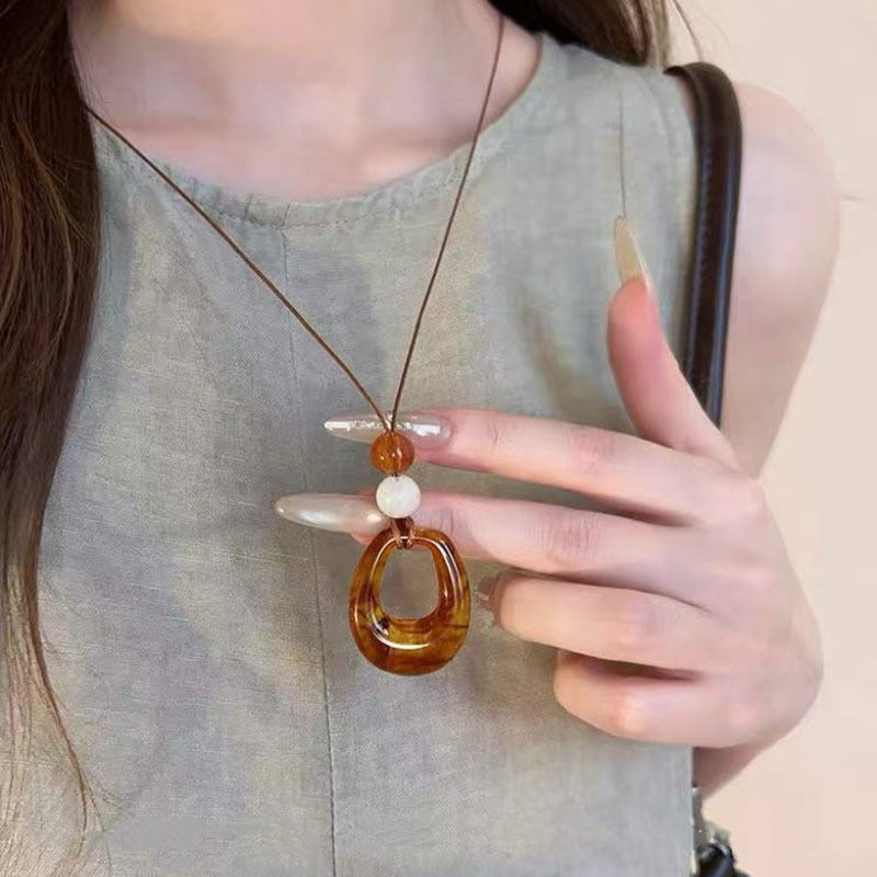 Otoño y invierno minimalistas collares colgante de goteo de Feng Shui mujeres chaqueta larga suéter cadena casual accesorios de lujo ligero