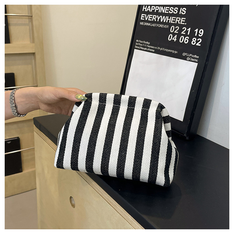 New cross-border fashion color-blocking striped cosmetic bag, women's loose change mobile phone storage bag, trendy and niche cloud clutch undefined