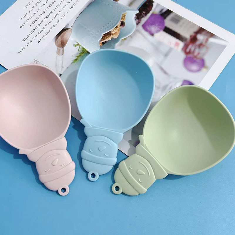Nuevo tipo de comida para perros cucharas de comida para gatos muñecos de nieve cucharas de comida para perros cucharas de impresión de dibujos animados cucharas de alimentos de plástico cucharas de grano para mascotas