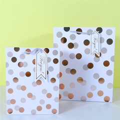 Cross-border special supply of hot stamping wavy pattern white card gift portable paper bag round ball five-pointed star shopping bag diagonal pattern
