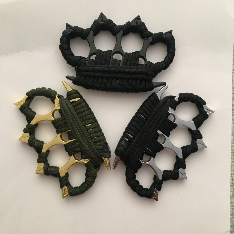 Refers to tiger anti-wolf thickened iron fist knuckles ring four fingers with thorns hand brace self-defense broken window with the car to survive self-defense