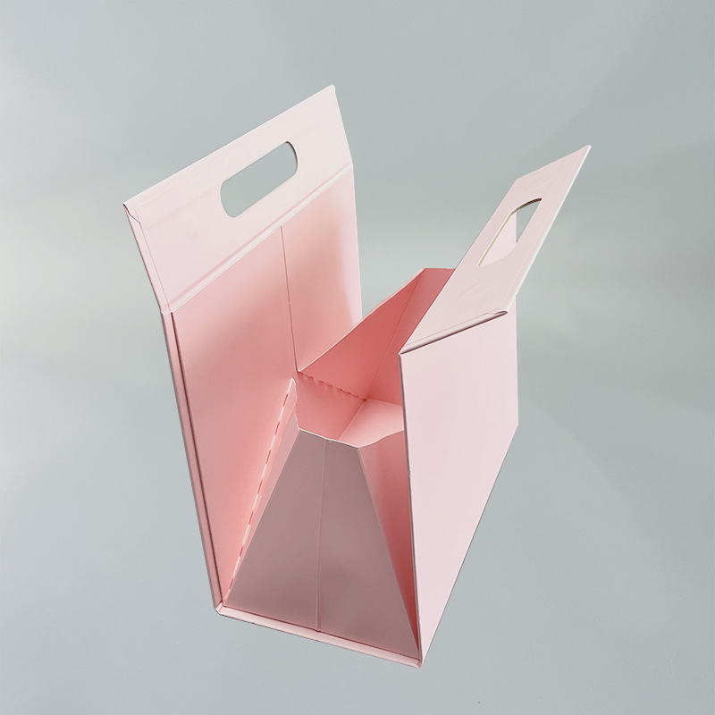 Caja de regalo plegable integrada en stock Caja de regalo plegable triangular rosa blanco negro