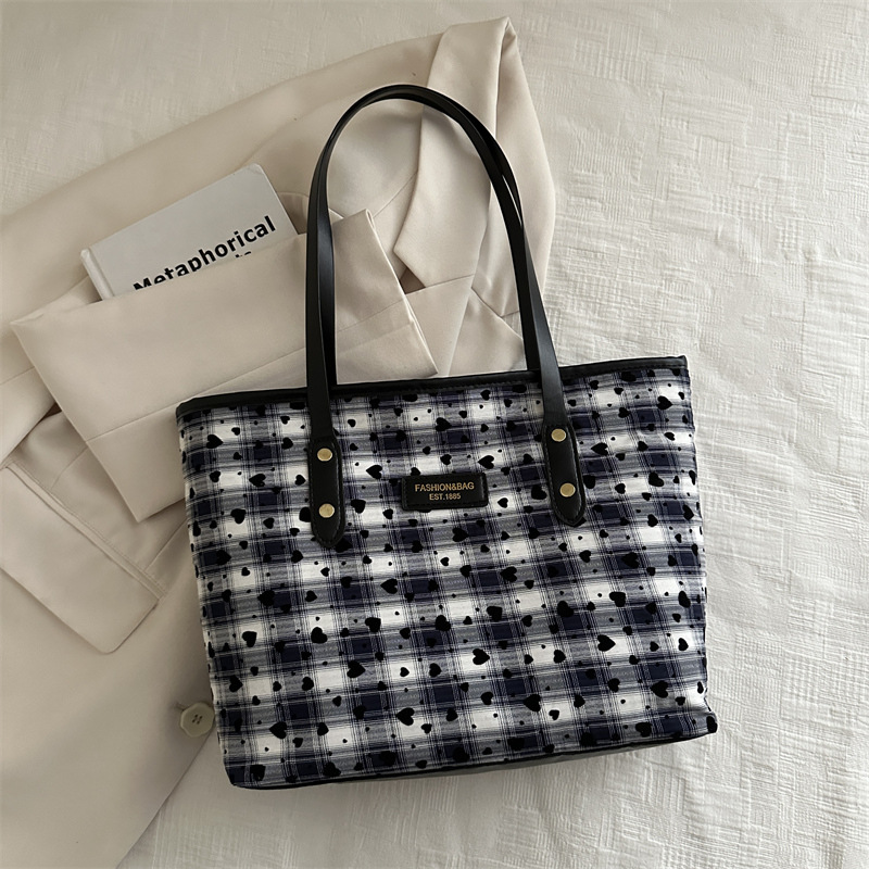 Bolsos para mujer 2024 nuevo bolso de alta capacidad popular de este año bolso de viaje casual de un solo hombro de otoño e invierno de todo fósforo