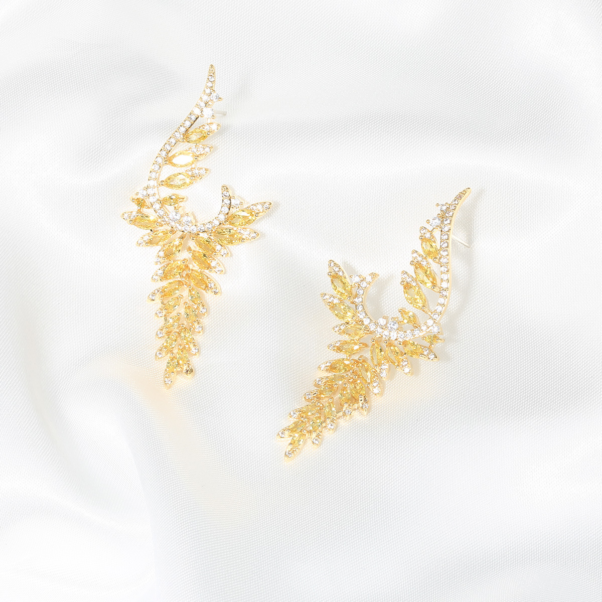 long fashionable elegant earrings drop-shaped with zircon with…