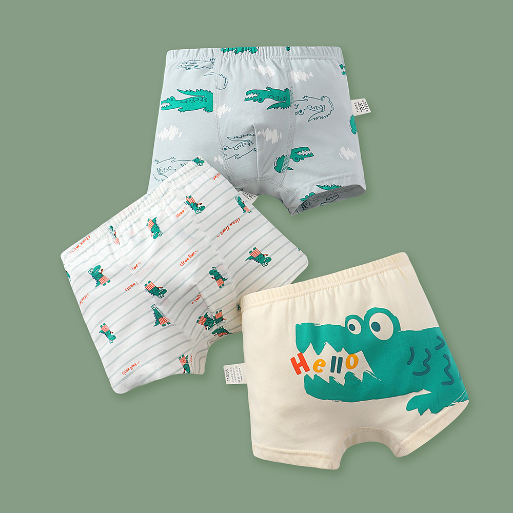Un tipo de ropa interior de algodón puro para niños dibujos animados dinosaurio niño boxer verano niño pequeño y mediano niño antibacteriano niño cuadrangular al por mayor