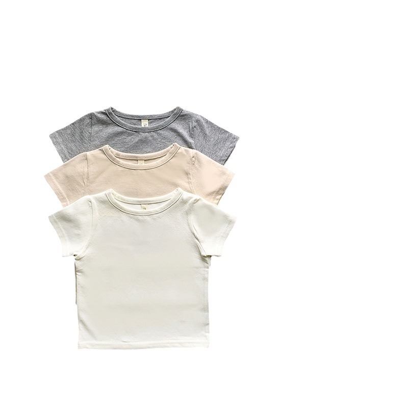 Ropa para niños japoneses y coreanos 2025 verano nuevo estilo delgado lindo color sólido para niños pequeños cuello redondo color sólido manga corta
